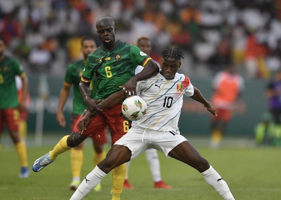 Laga Guinea dan Kamerun berakhir imbang di Piala Afrika 2023. Foto: instagram.com/sylinational