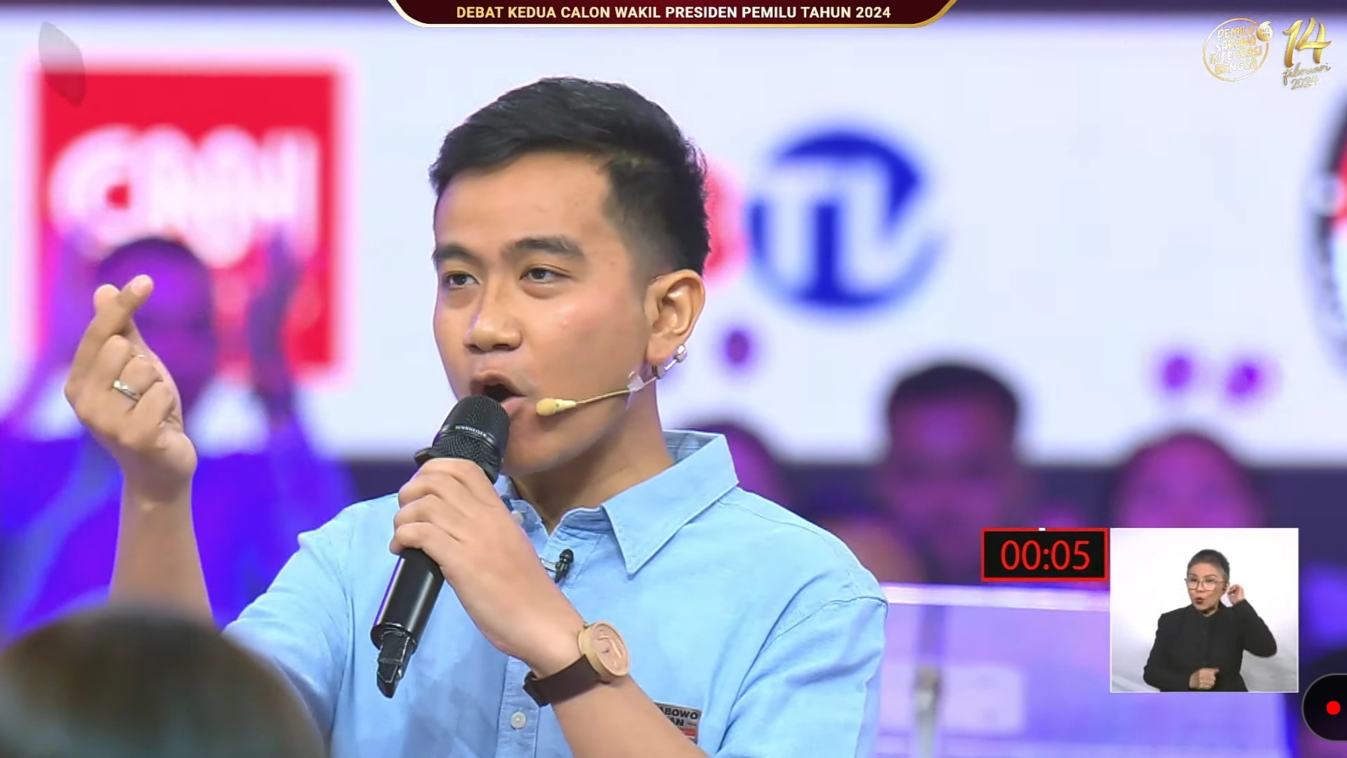 Gibran tanggapi jawaban paslon lainnya dengan contoh programnya di Solo. Foto: Tangkapan Layar Youtube KPU RI